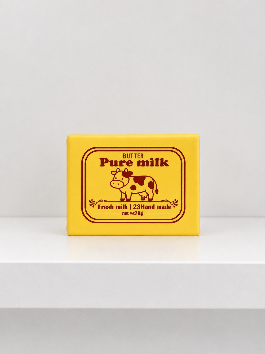Front view of the Butter Milk squishy with its cow design