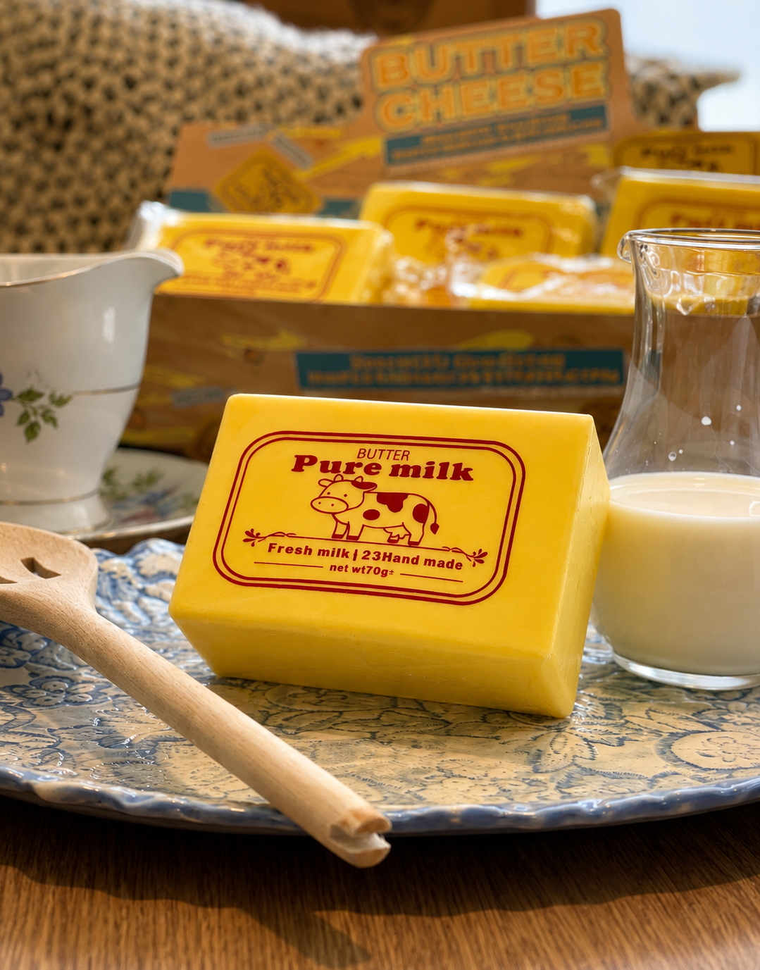 Butter Milk squishy styled beside a glass of milk