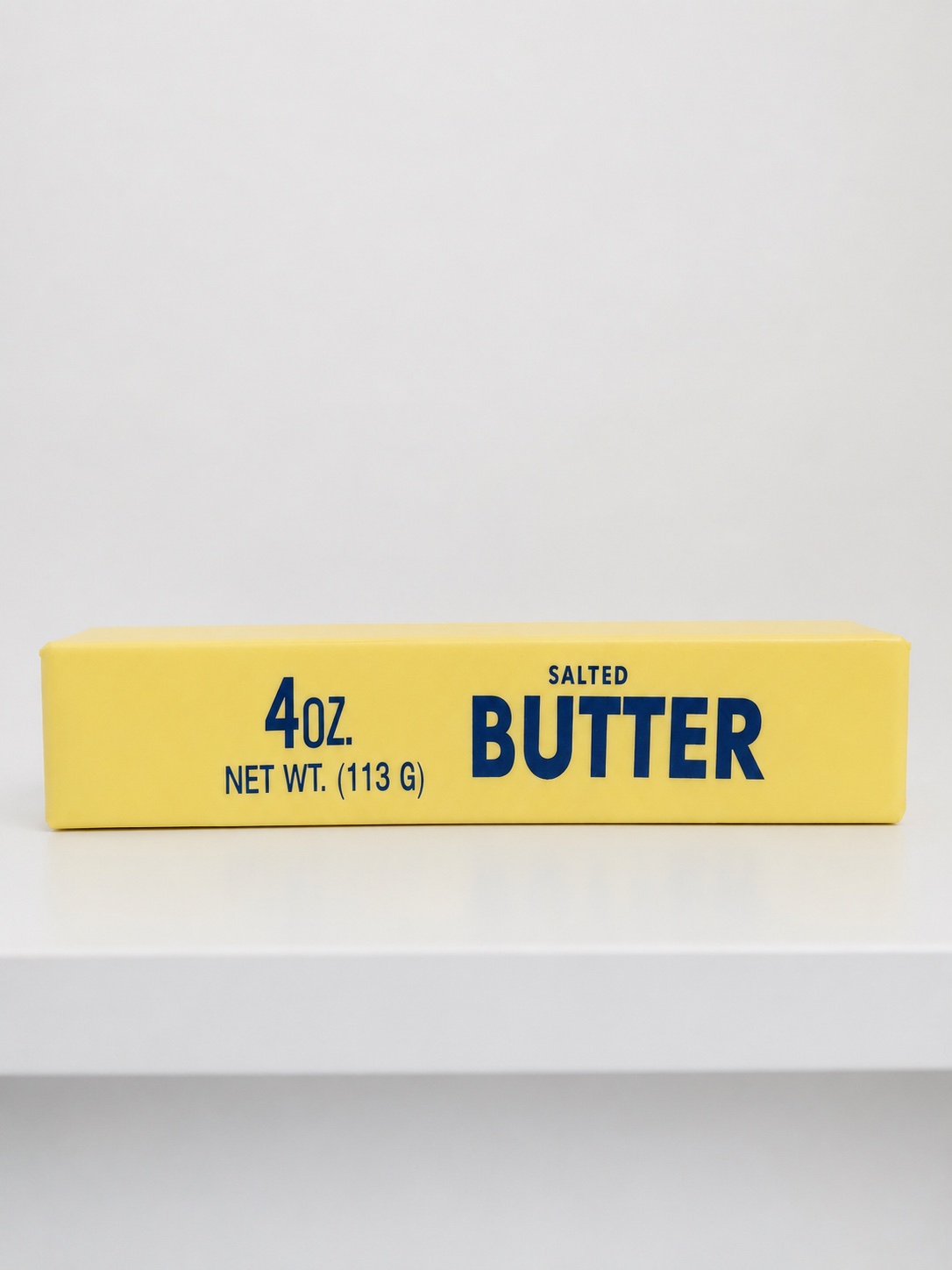 Front view of the Jumbo Butter Squishy with blue lettering
